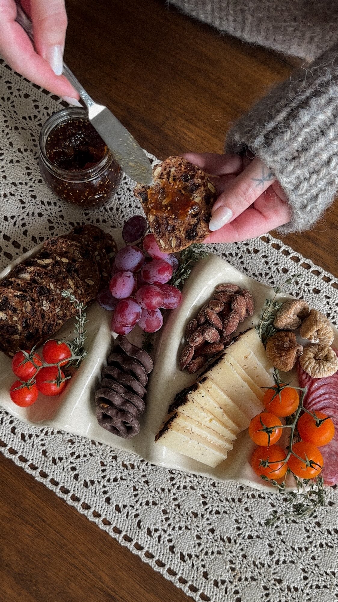 Instagram post by @thegoodrichwife for etsy. Caption reads: Let’s build a charcuterie board 🧀🍇
I love love....