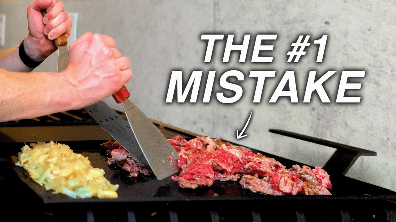 YouTube post by @CharlieAndersonCooking for Baking Steel. Caption reads: Why Everyone Makes Philly Cheesesteaks Wrong....