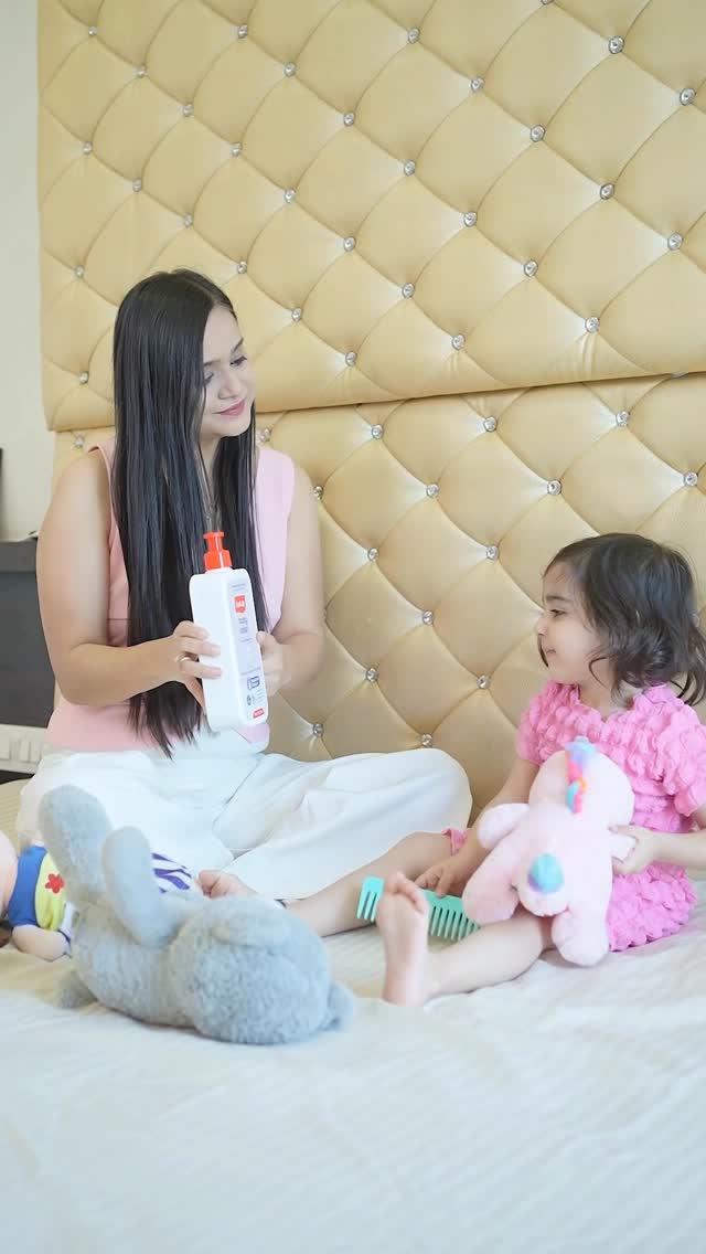 Instagram post by @kaira.bhojwani for LuvLap. Caption reads: Twinning smiles, matching giggles, and endless....