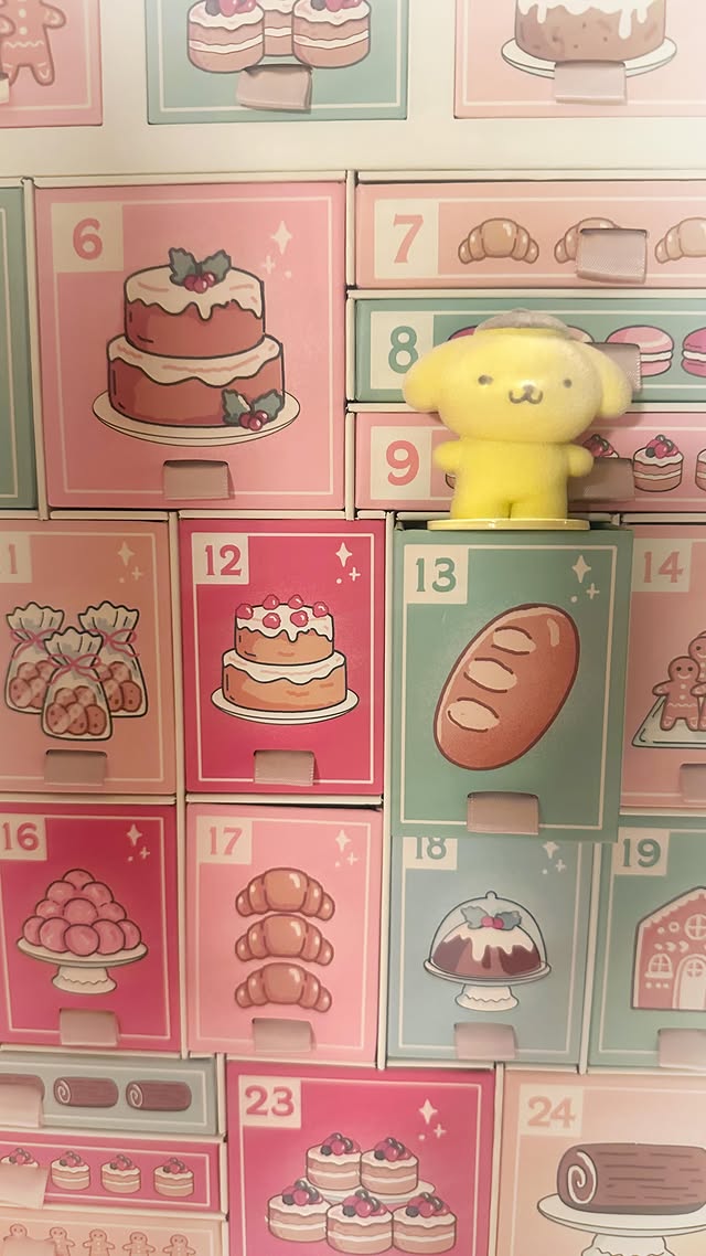 Instagram post by @rosymaplesloth for Sanrio. Caption reads: Open day 13 of my Sanrio advent calendar with me!....