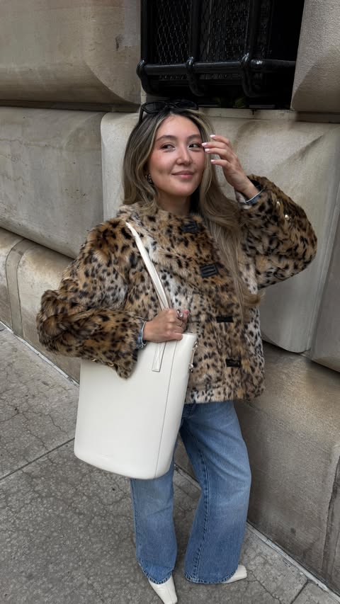 Instagram post by @saltanyc for CALPAK. Caption reads: The CALPAK Haven Laptop Bucket Bag is my new [...].