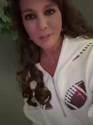 TikTok post by @christinaw1022 for Molitree. Caption reads: The CUTEST half zip for game days @Molitree....