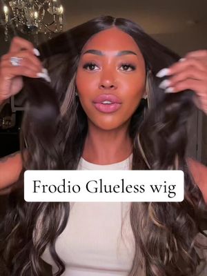 TikTok post by @barbiefab1 for Frodio Hair. Caption reads: [...] glueless and ready to wear by @FRODIO....