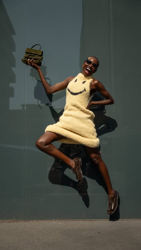 Instagram post by @amina.ladymya for Moschino. Caption reads: [...] happy day in my favorite sunnies ☀️....