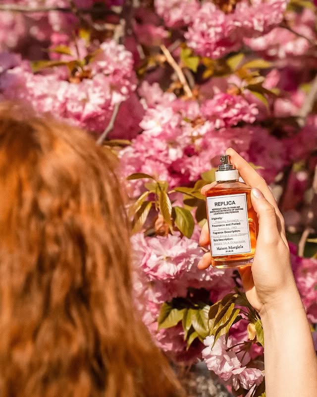 Instagram post by @kate_romanoff for Maison Margiela Fragrances. Caption reads: Chasing Sunsets from @maisonmargielafragrances is....