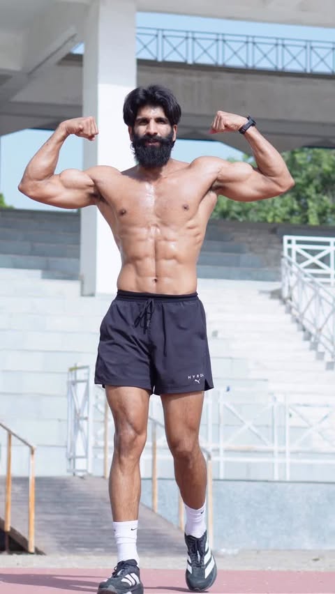 Instagram post by @vikas_yadav.12 for MuscleBlaze. Caption reads: 🐴 @wrathxenergy @muscleblaze Code - YADAVGMB #gym....