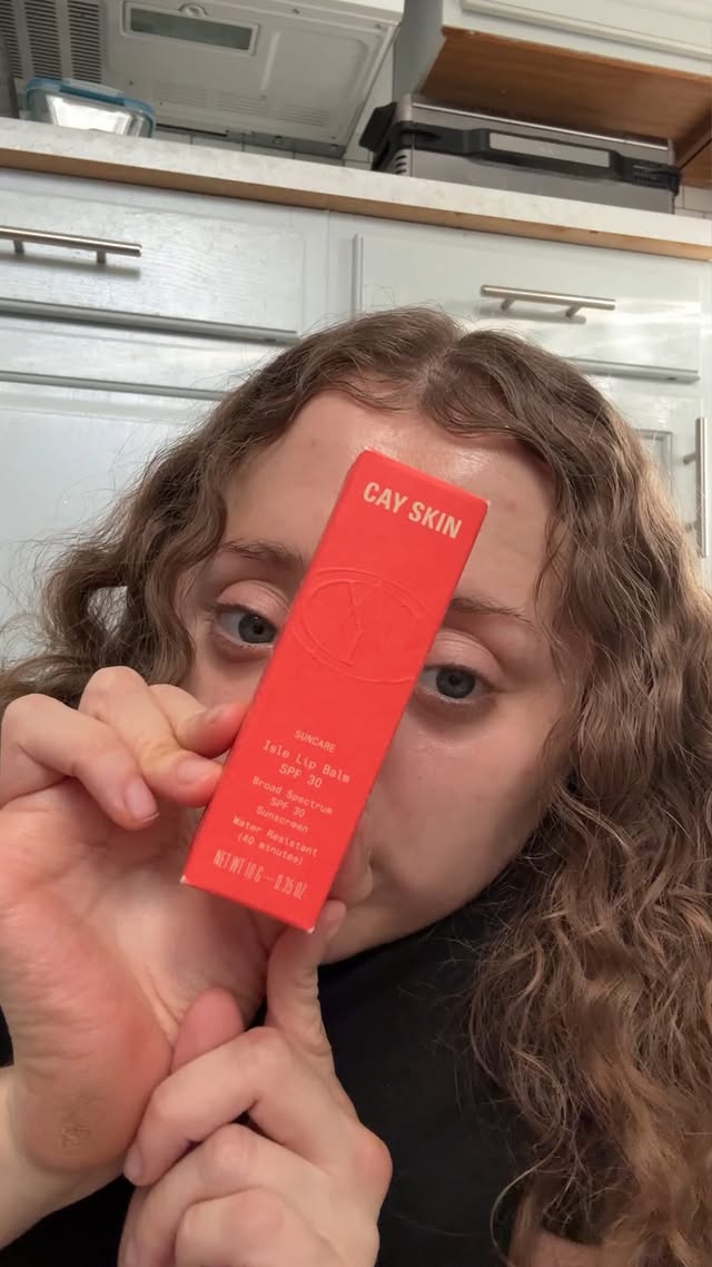 Instagram post by @kelsey_dworchak for Cay Skin. Caption reads: [...] THE SUN, NOT THE SHINE! 💋✨ Meet the....