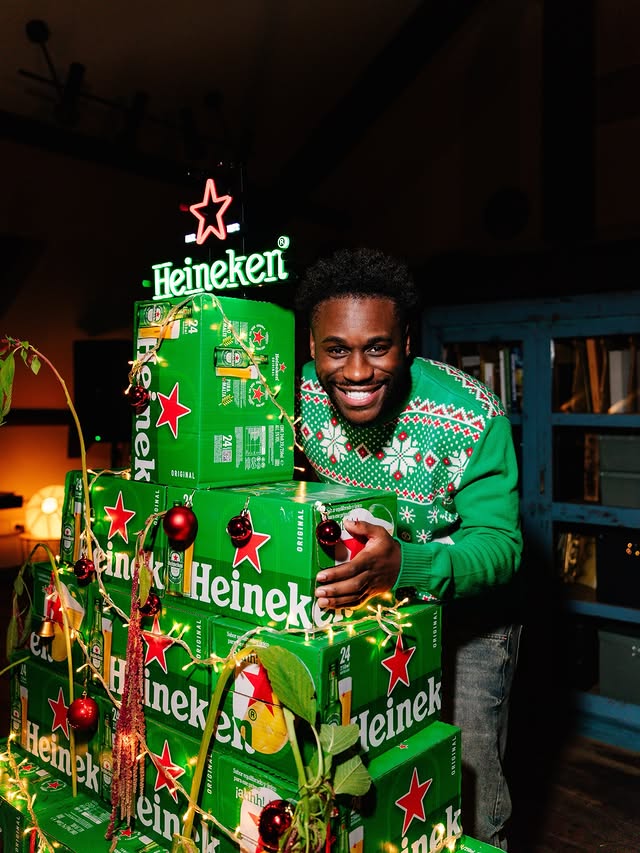 Instagram post by @migueloparaiso for Heineken Portugal. Caption reads: A tradição mantém-se 💚🧪 Jantar de Natal dos....