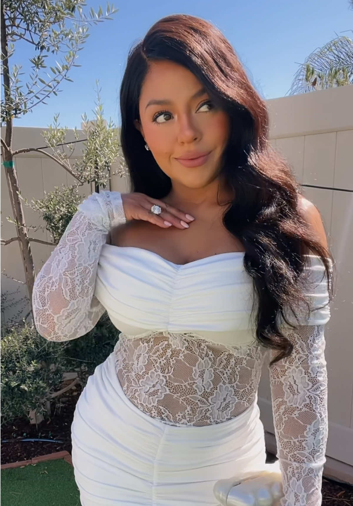 TikTok post by @lesliejoanna_style for OQQ. Caption reads: [...] #summerdress#receptiondress #tiktokshop....