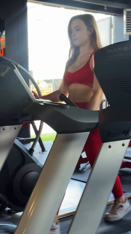 Instagram post by @urszulakolodziej_ifbbpro for NEBBIA. Caption reads: Red is my colour ♥️ PROMOKOD: fitula....