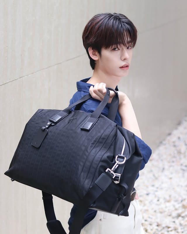 Instagram post by @porsuppakarn for RIMOWA. Caption reads: stay restless, stay inspired. @rimowa 
#RIMOWA....