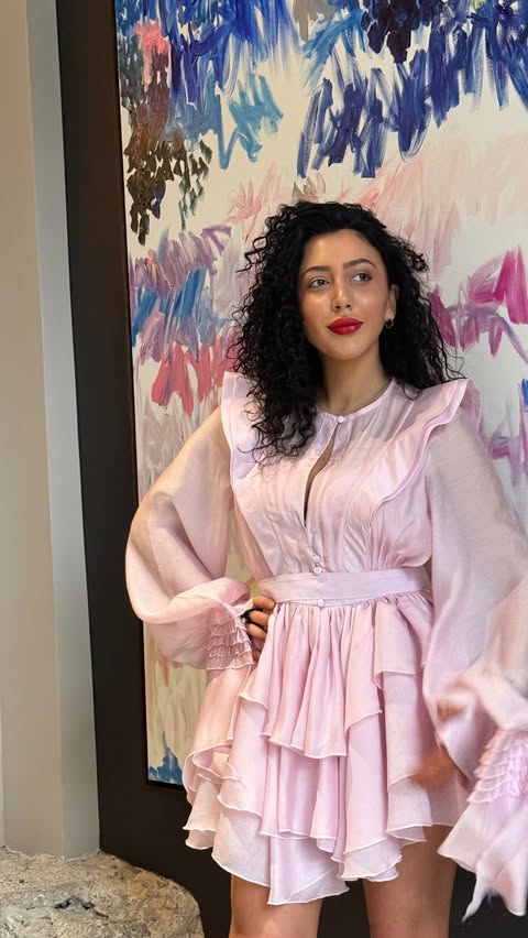 Instagram post by @natiatatalashvili___ for JardinVue. Caption reads: Stepping into the day in this dreamy dress from....