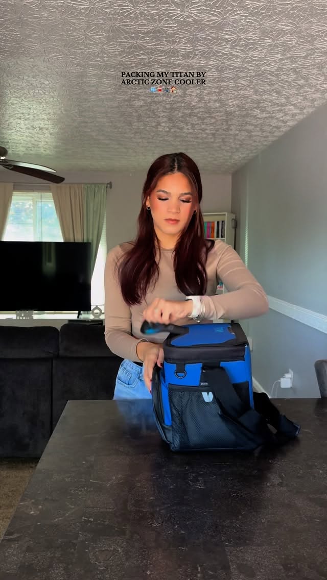 Instagram post by @aismar11_ for Arctic Zone. Caption reads: Using my titan by arctic zone cooler on every trip....