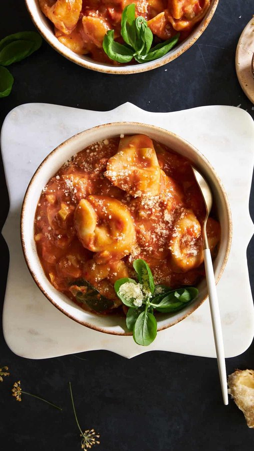 Instagram post by @fooddolls for Pacific Foods. Caption reads: This cozy tortellini soup is exactly what you need....