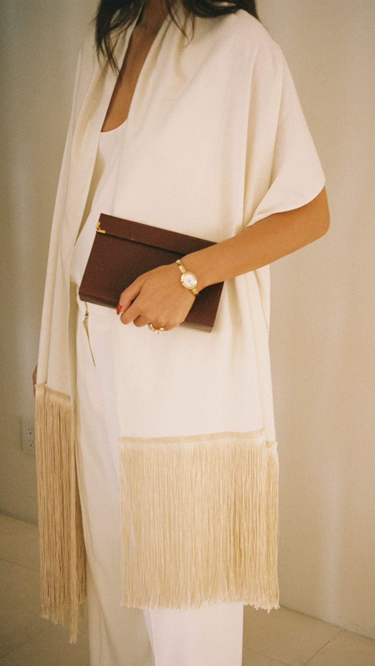 Instagram post by @taniasarin for Movado. Caption reads: You can never go wrong with all white and a hint....