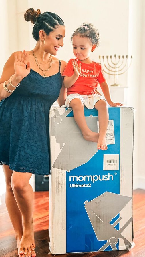 Instagram post by @r.e.v.i.n.tara for Mompush. Caption reads: Our new stroller 🤍 @mompush_stroller Introducing....