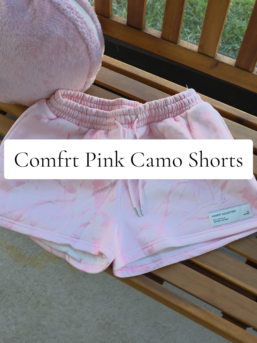 TikTok post by @mauithegolden2 for Comfrt. Caption reads: Just Dropped! Comfrt Pink Camo Shorts on sale....