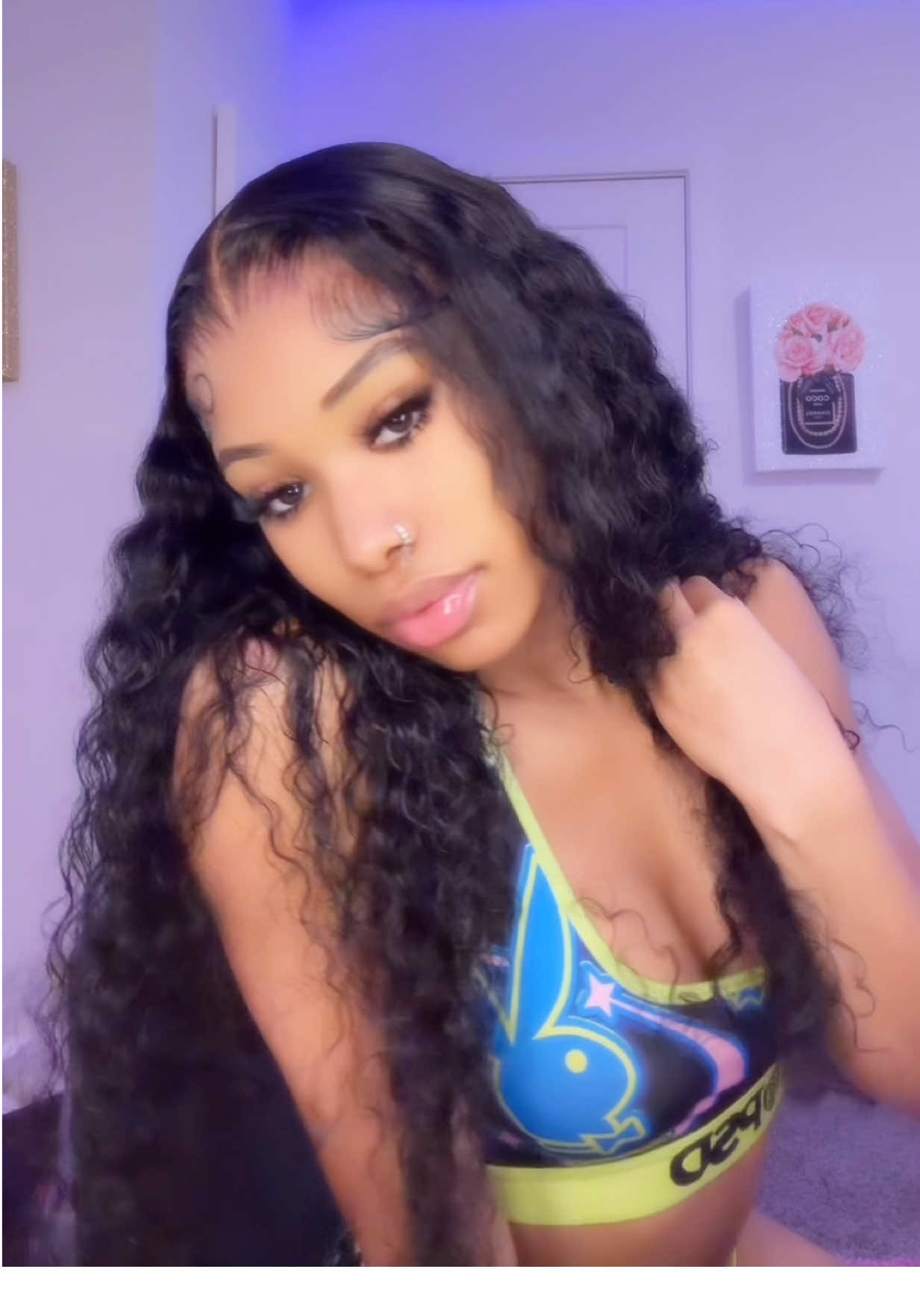 TikTok post by @parisayani for Bling Hair. Caption reads: This curly wig from @Bling Hair Fashion is so....