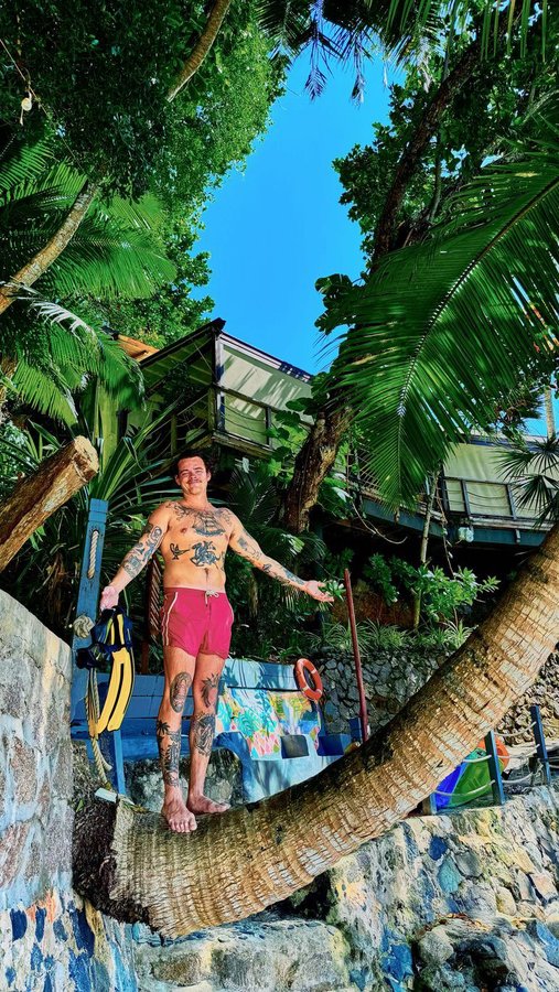 Instagram post by @mgm_patrick for Hilton Hotels & Resorts. Caption reads: @tesschristinexo and I just celebrated our five....