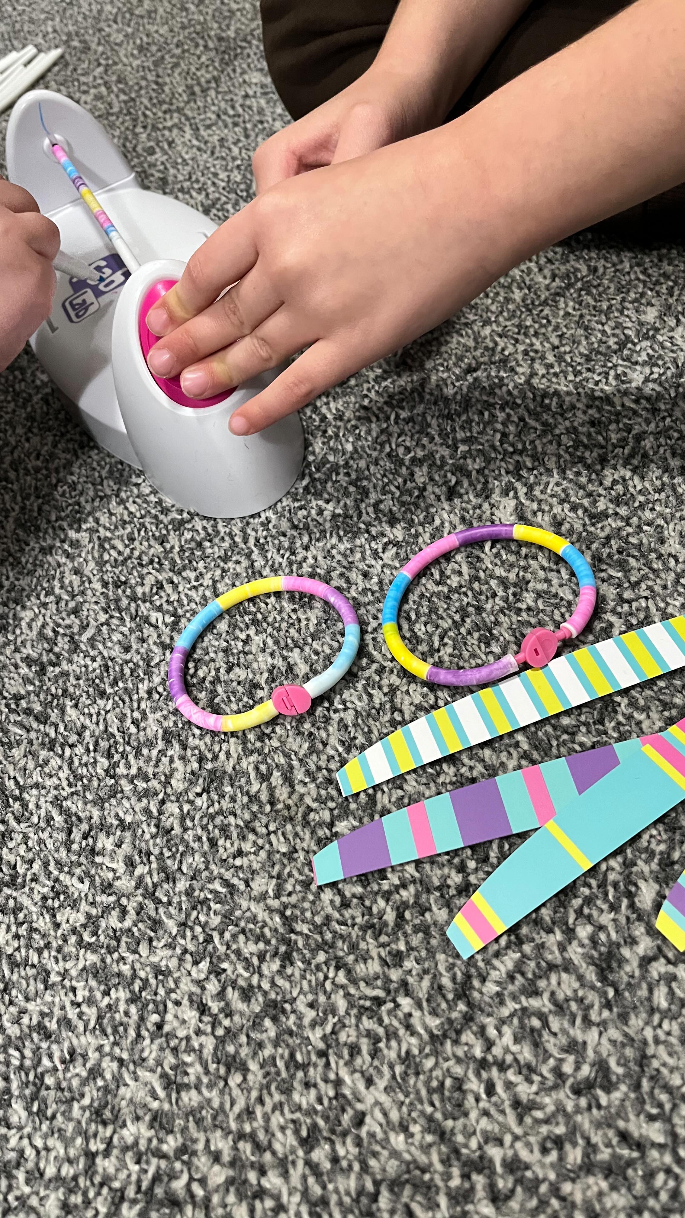 Instagram post by @amummyandherbeautifulgirls for Wire PR. Caption reads: ✨ The most beautiful Colour Spin bracelet Making....