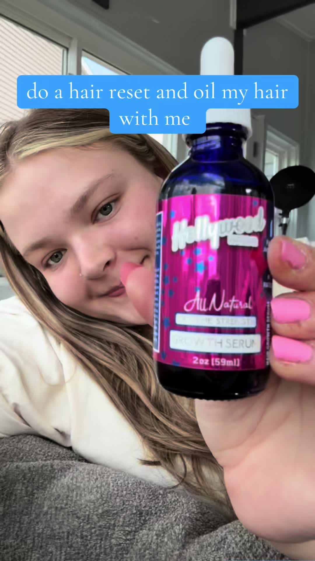 TikTok post by @zoekertesz2024vb for Hollywood Hair Bar. Caption reads: The Hollywood Hair Bar Scalp Stimulating Oil, an....