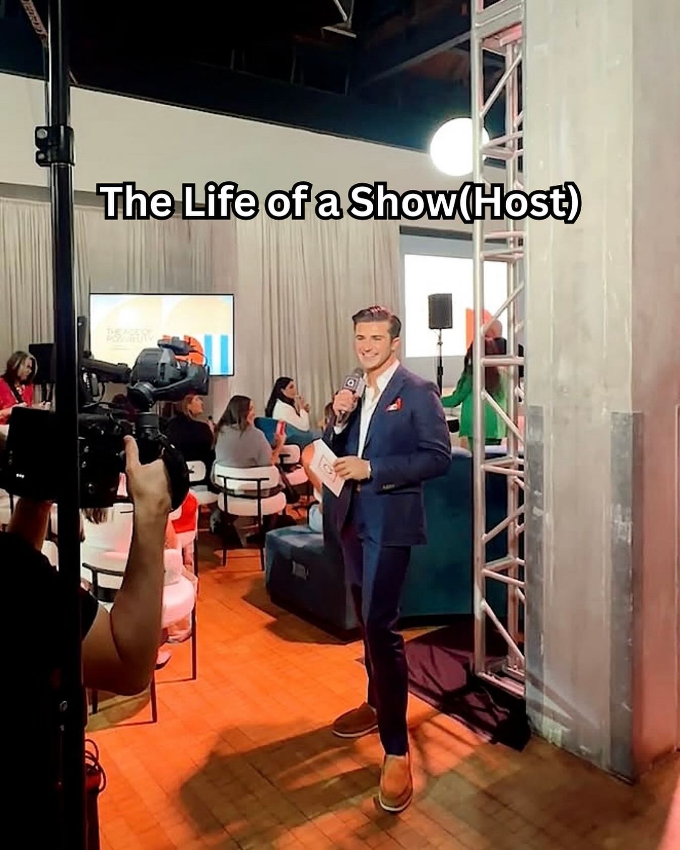 Instagram post by @johnbattaglieseqvc for Qvc. Caption reads: 🎥🧡🎤✨.