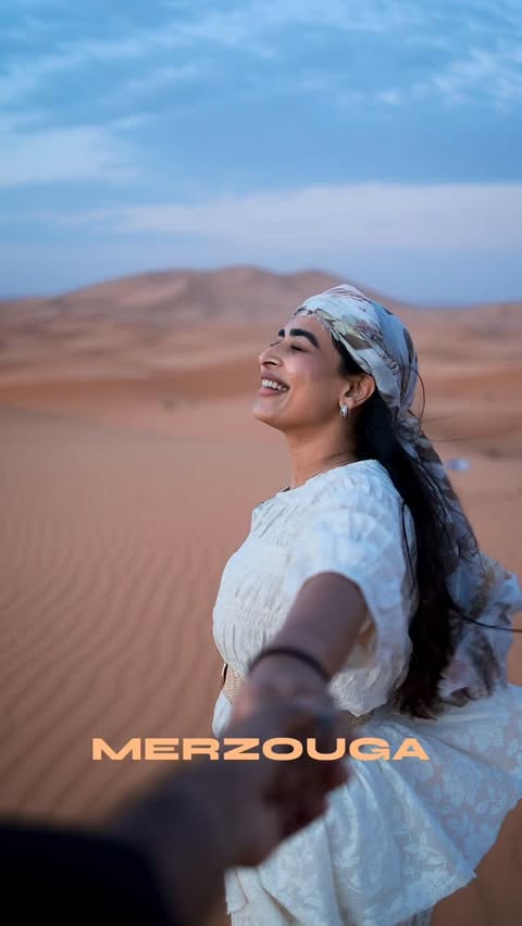 Instagram post by @odysseyoftwo for GT Holidays. Caption reads: Marrakech is magic… but Merzouga? Another....