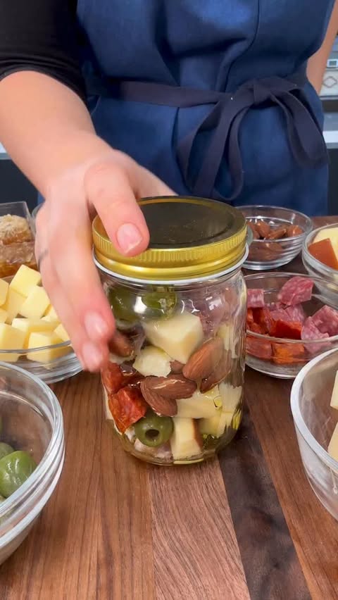 Instagram post by @francescadzani for Delish. Caption reads: Girl dinner, on the go 💅 These adorable little....