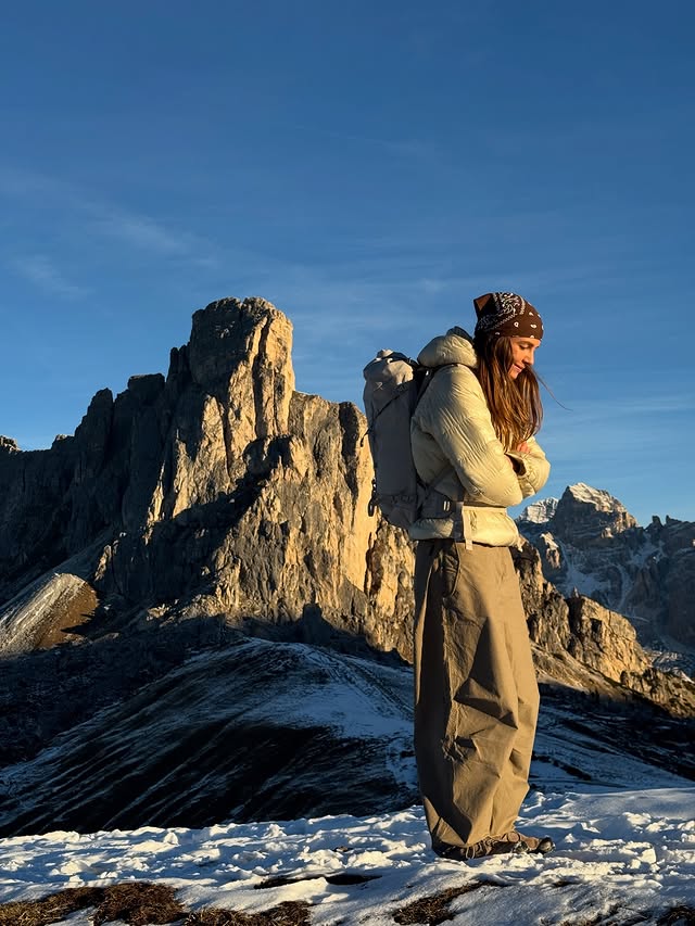 Instagram post by @hildurkarlsson for Osprey Packs. Caption reads: Ad. Dolomites feels like something out of a....