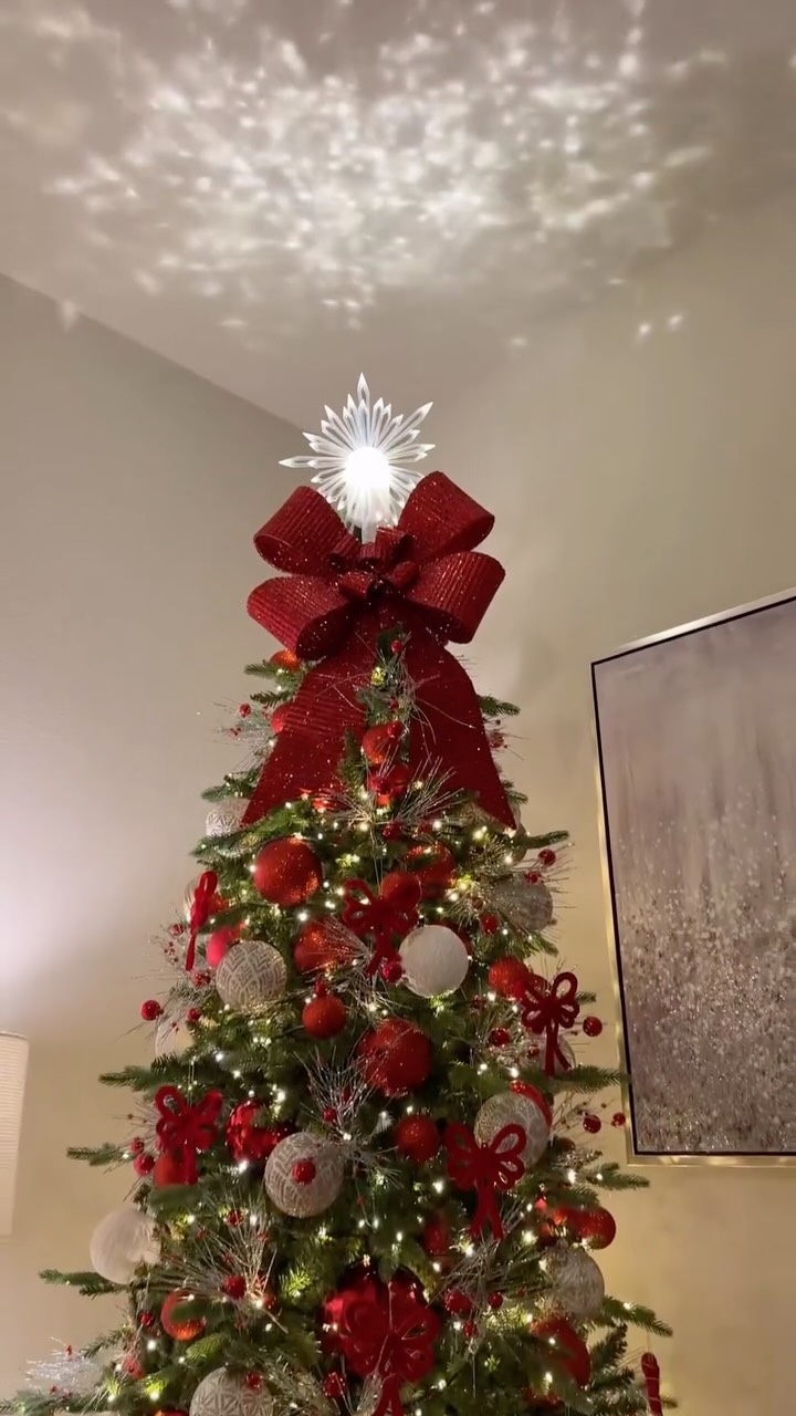 Instagram post by @rociosdesign for King of Christmas. Caption reads: Love decorating the Tree ✨ We’re so Christmas....