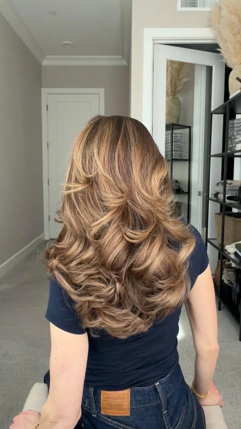 Instagram post by @nicholeciotti for FHI Heat. Caption reads: [...] waves 💁‍♀️ The SwiftStyler from @fhiheat....