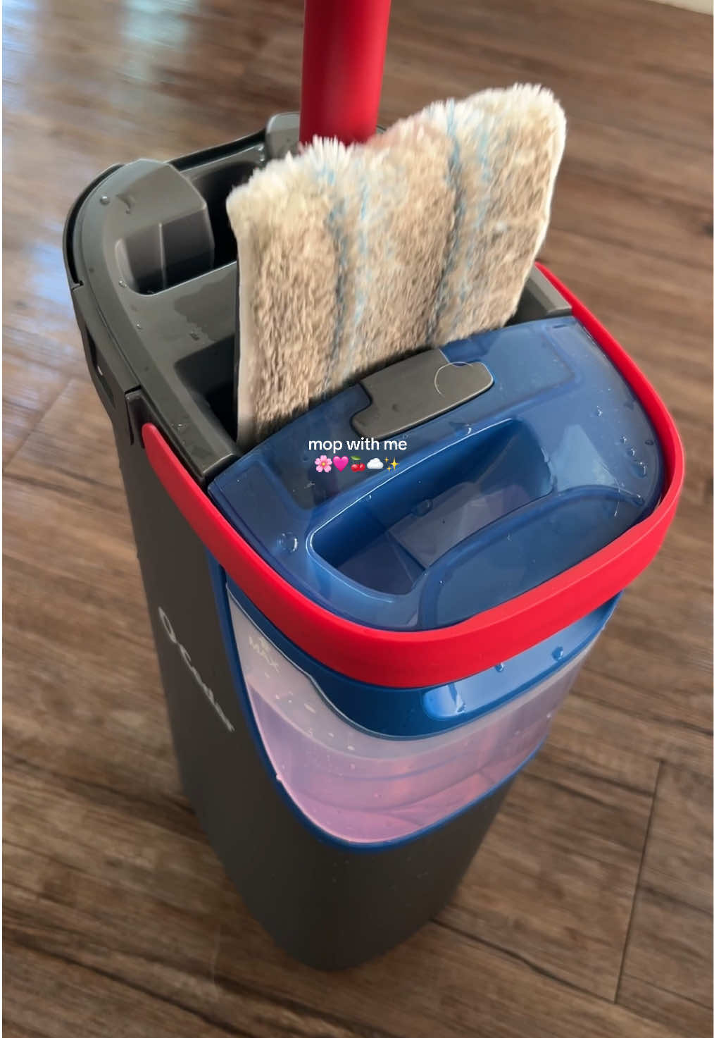 TikTok post by @brittany_qz for O-Cedar. Caption reads: mop with me using the @O-Cedar h2prO flat mop. I....