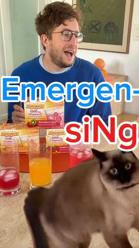 Instagram post by @mervthepet for Emergen-C. Caption reads: [...] 🚨 🎤 🍊 Vote for who sings the @emergenc....