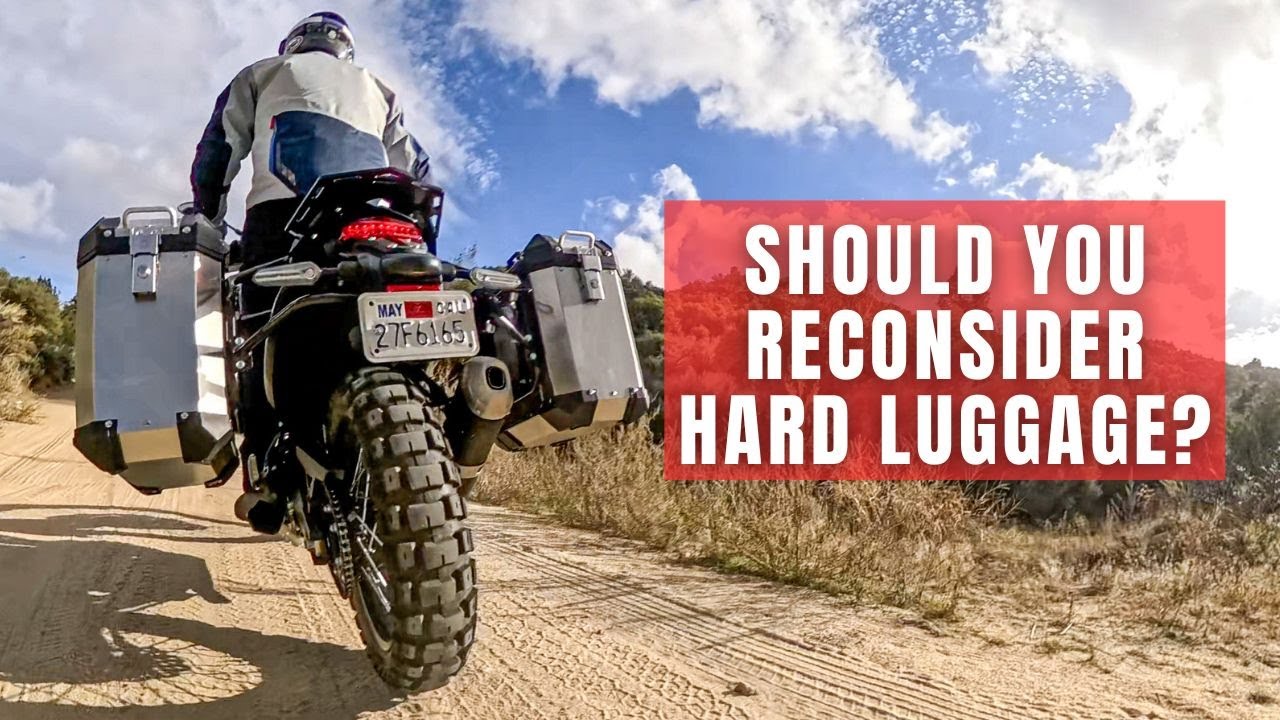 YouTube post by @BigRockMoto for CHIGEE. Caption reads: Ride Tested: Tusk Frontier Panniers | Premium....