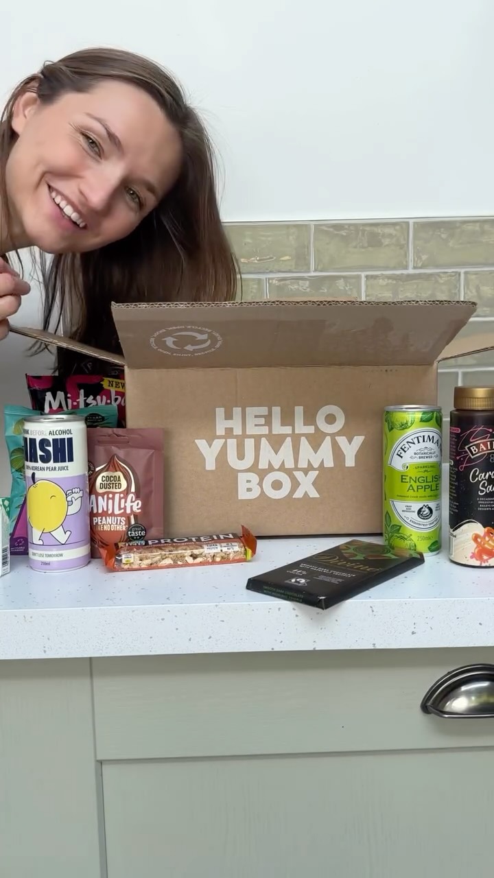 Instagram post by @livingwithloren for Hello Yummy Box. Caption reads: Stocking up the snack cupboard doesn’t have to be....