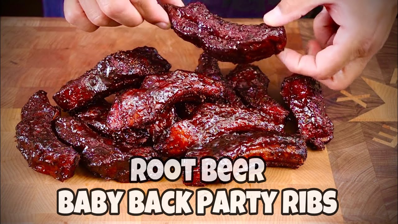 YouTube post by @SmokinJoesPitBBQ for VEVOR. Caption reads: Root Beer Baby Back Party Ribs - Smokin' Joe's Pit....