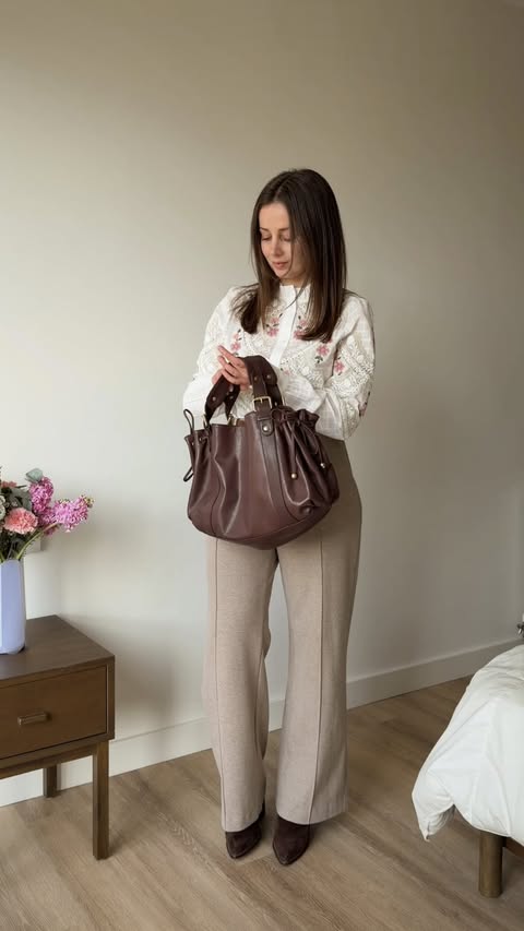 Instagram post by @sarahmantelin for FatFace. Caption reads: [...] Outfit 4 Top @sezane Belt @fatface Trousers....