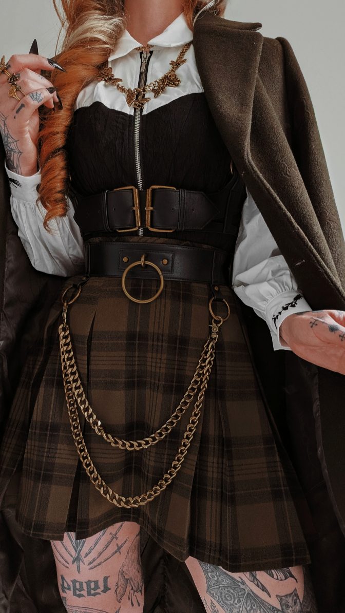 Instagram post by @kllsym for DISTURBIA. Caption reads: Another gorgeous green ensemble from @disturbia....