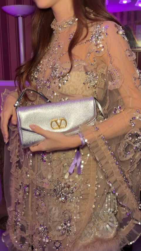 Instagram post by @nickypassarella for Valentino. Caption reads: [...] Born In Roma purple melancholia by....