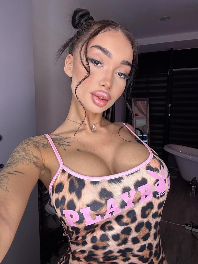 Instagram post by @alexandra_teodora_ for Playboy. Caption reads: Sponsored by @playboy 🐰🩷.