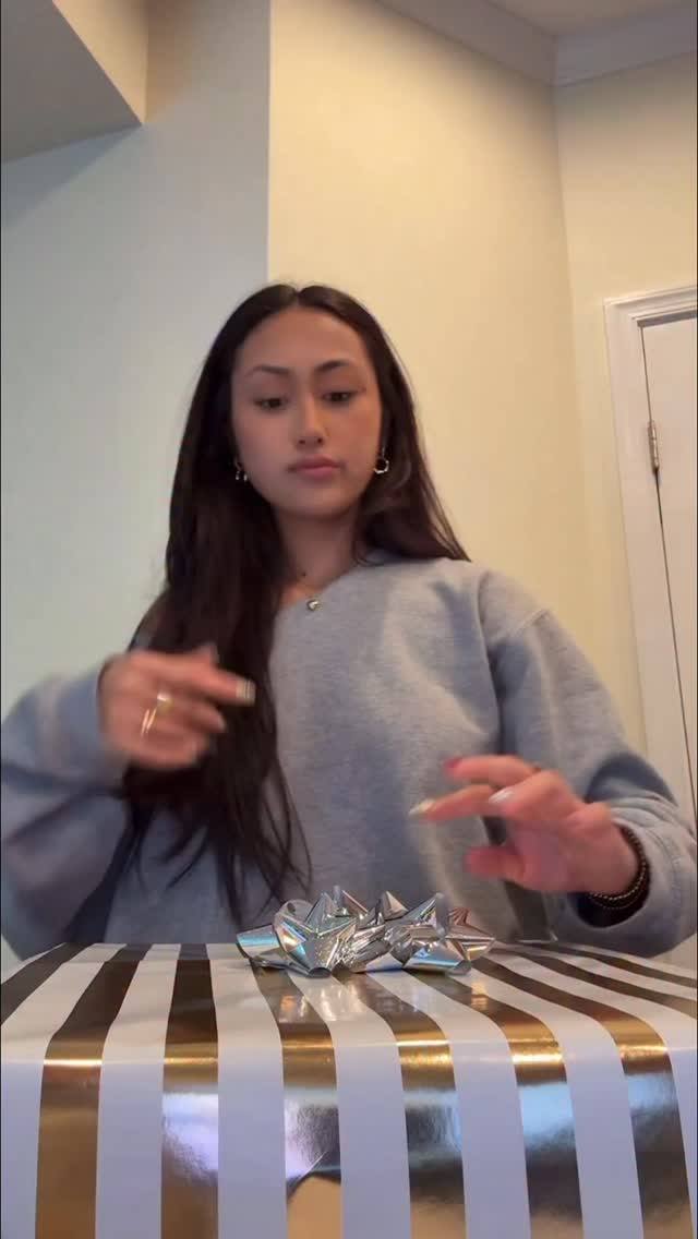 Instagram post by @iamsofiajavier for Afterpay. Caption reads: Cat eye? Snatched. Gifts? Secured. Wallet?....