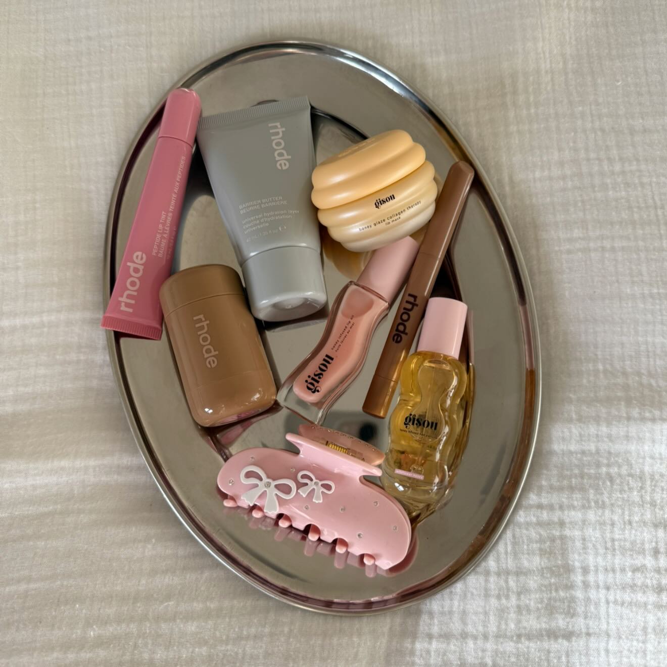 Instagram post by @carrieanne_ for Emi Jay. Caption reads: recent faves 💓🪽💫

@rhode* @gisou* @emijayinc*....