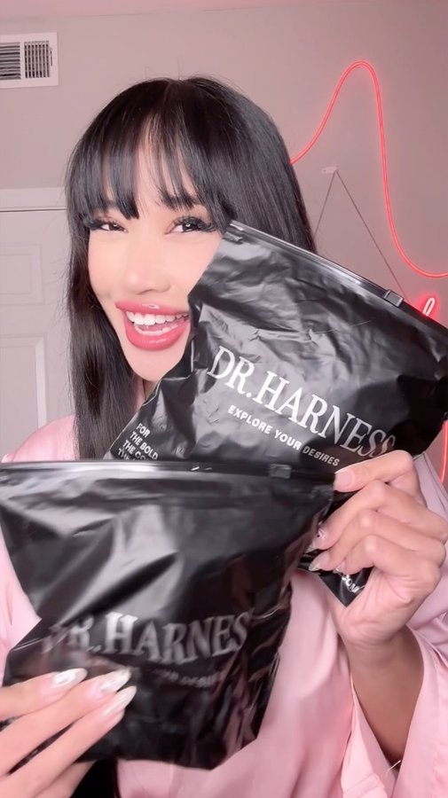 Instagram post by @amyfabooboo for DrHarness. Caption reads: The Evelyn Set from @dr.harness 🖤 #ad.