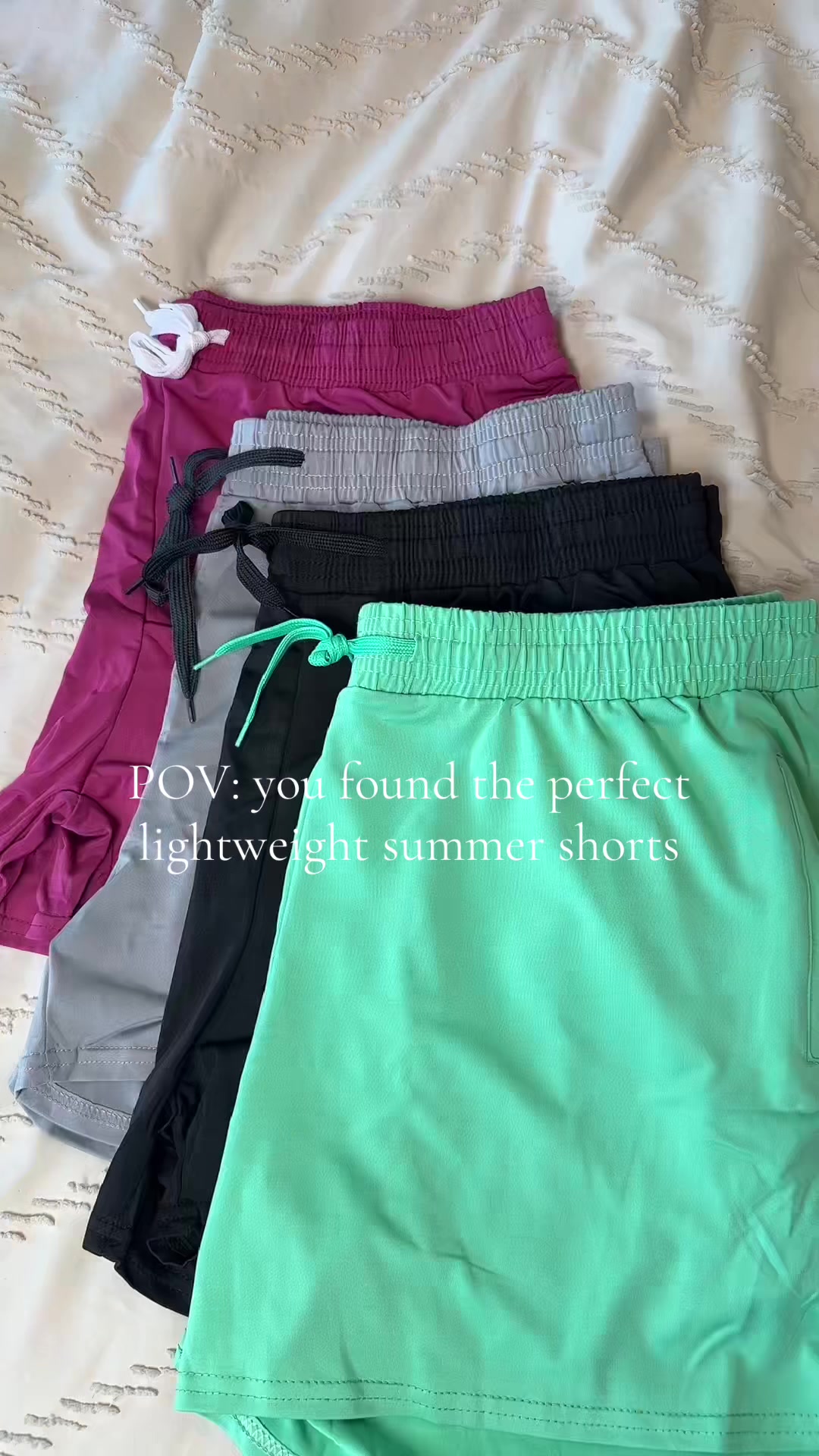 TikTok post by @k.singleton for Real Essentials. Caption reads: @Real Essentials Apparel #summershorts [...].