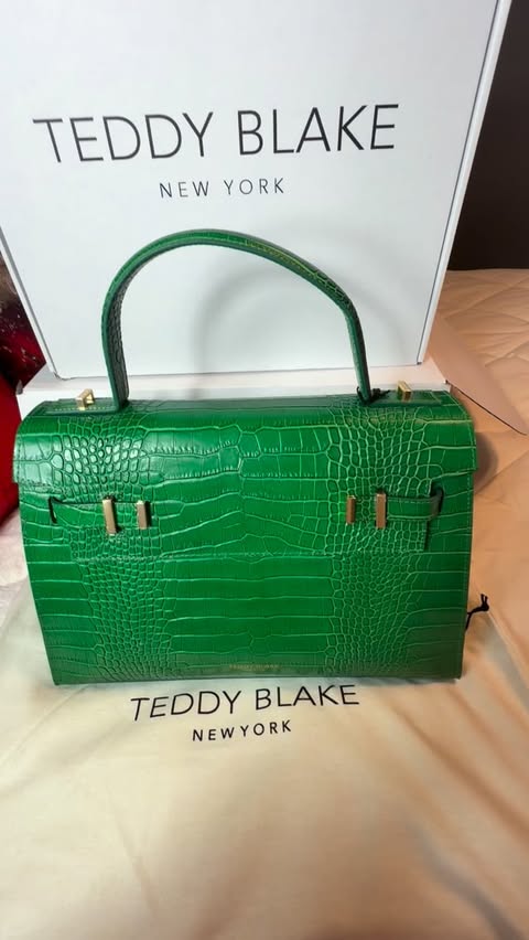 Instagram post by @deanna_lynn.decor for Teddy Blake. Caption reads: Teddy Black green Ava Croco Purse 14 inch is....