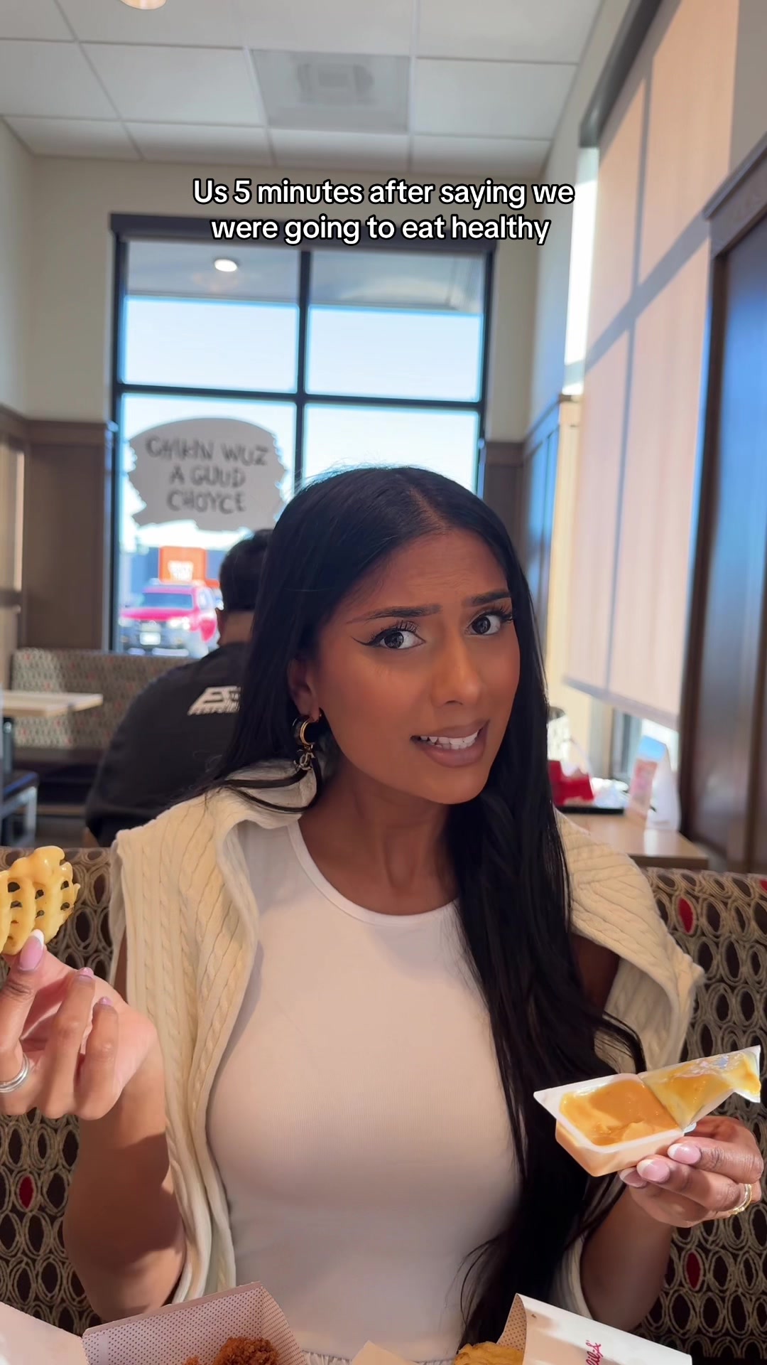 TikTok post by @wingitbeauty for Chick-fil-A. Caption reads: Whoops 😳🍔🍟 @Chick-fil-A #chickfila #fastfood....