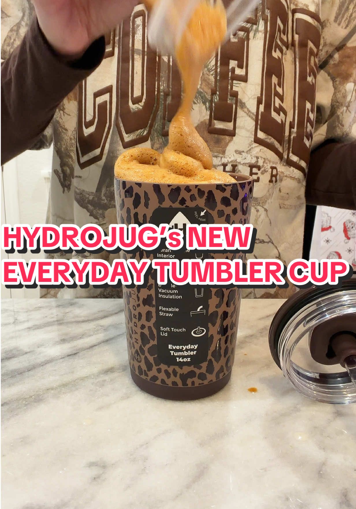 TikTok post by @kenlyealtumofficial for HYDROJUG. Caption reads: [...] print?! It was a must have 🤎🐆🖤 @HYDROJUG....