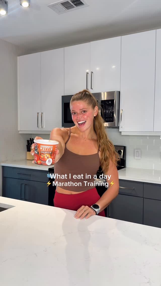 Instagram post by @fitbymakayla for Kodiak Cakes. Caption reads: What I eat in a day training for: Chicago Marathon....