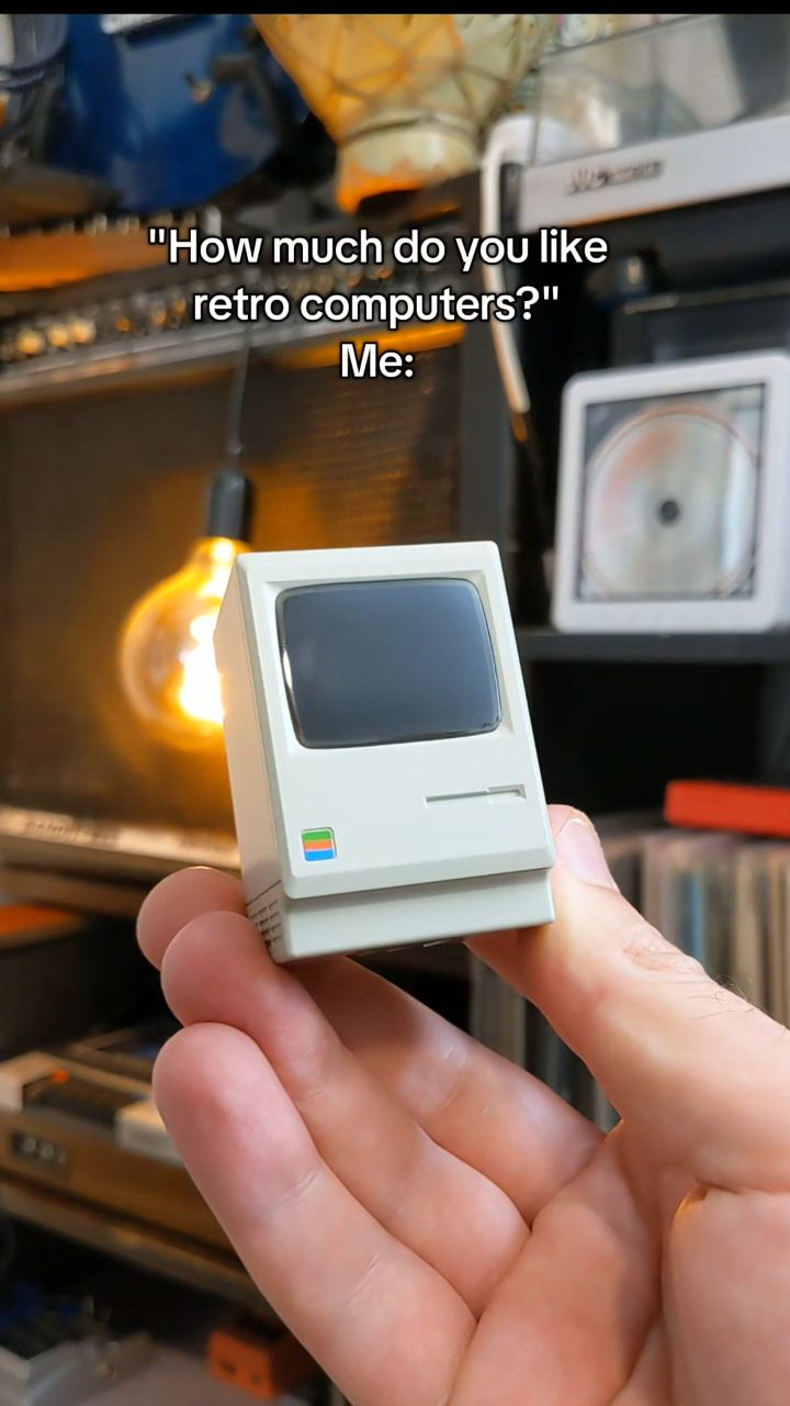 Instagram post by @emazamboni for SHARGE. Caption reads: [...] expensive.  #retrotech #mac #technology....