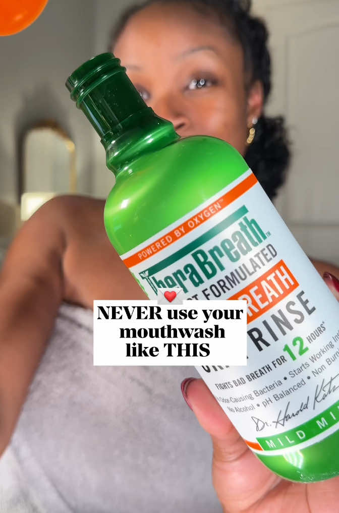 TikTok post by @iamkhaelan for TheraBreath. Caption reads: NEVER waste your mouthwash that way. Using the 90....